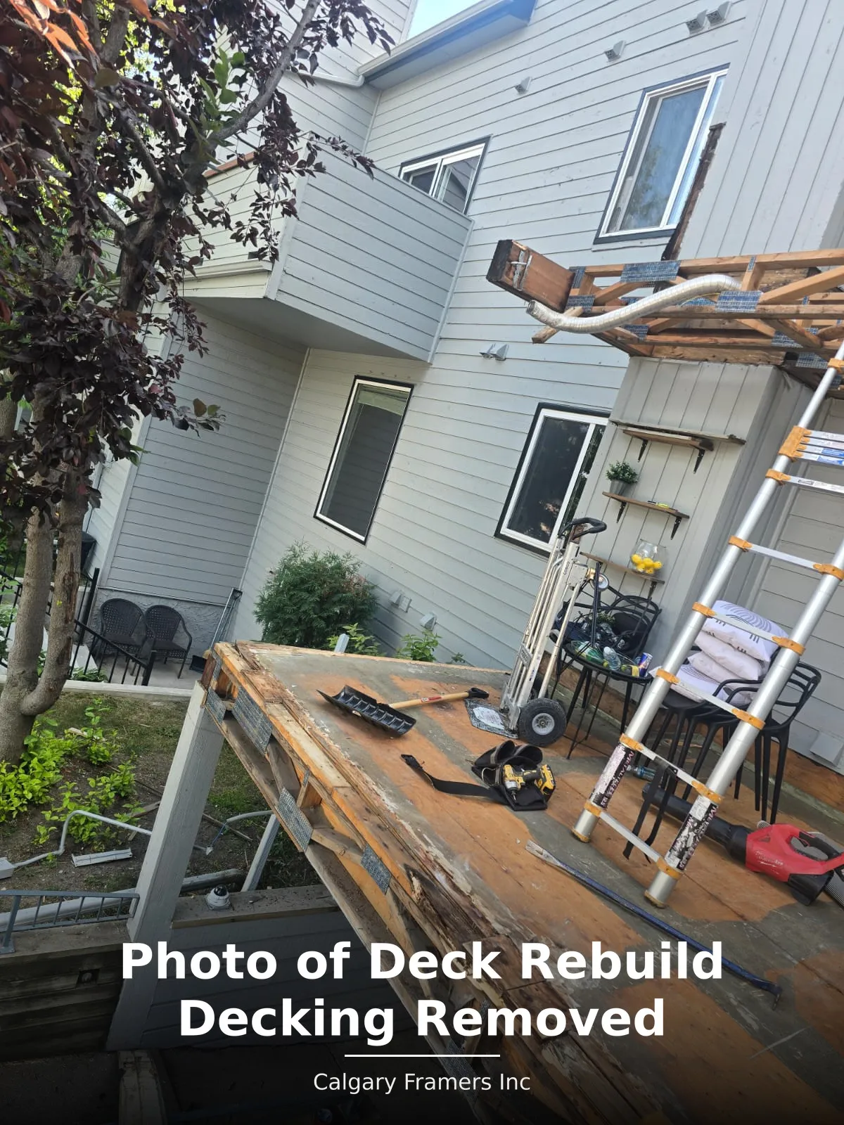 Second-storey balcony with the decking removed for rebuild