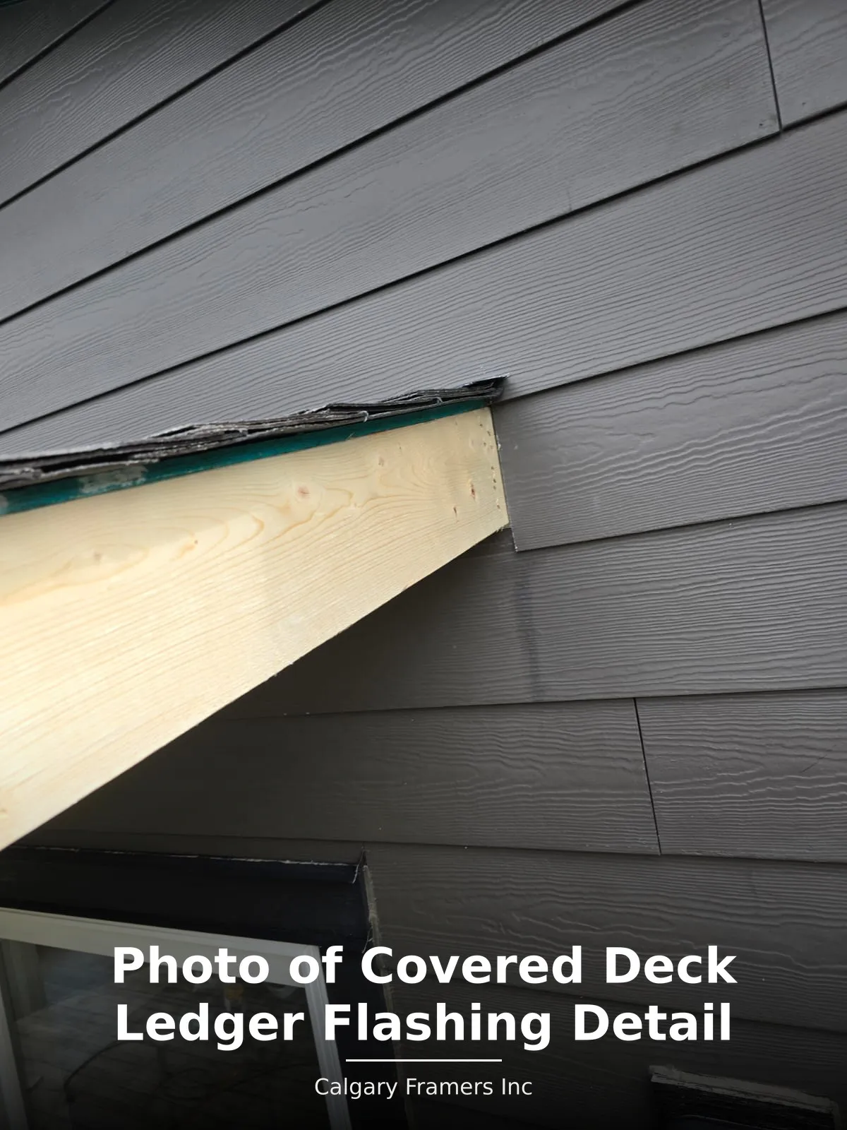 Covered deck ledger flashed into Hardie board lap siding with no planks damaged
