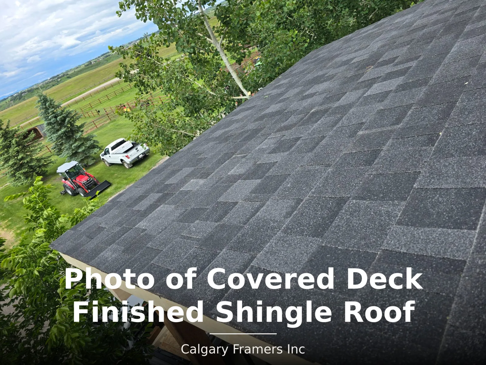Finished asphalt shingle roof on a covered deck, shingled to match the existing house