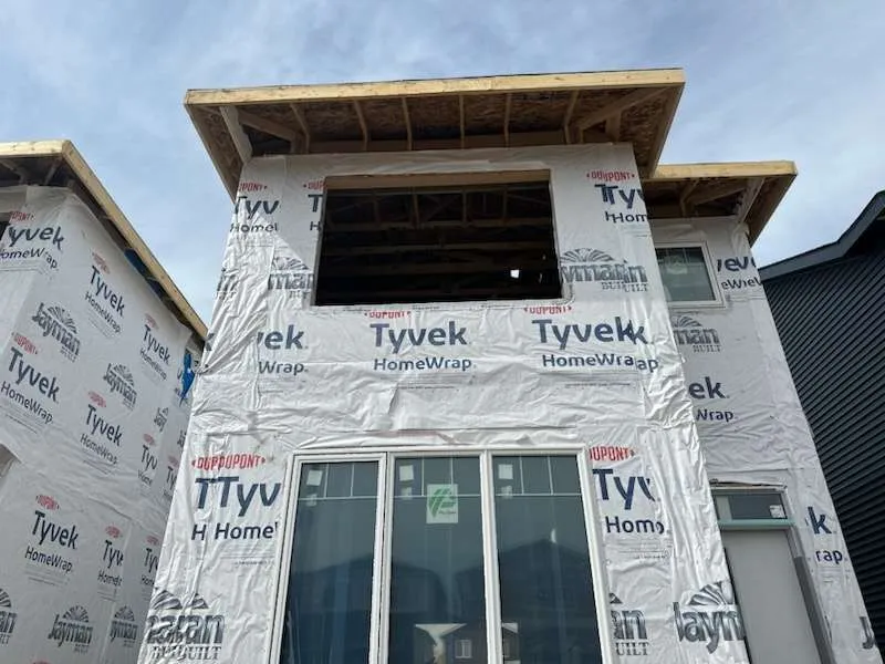 Custom home framing in Calgary at the rough framing stage