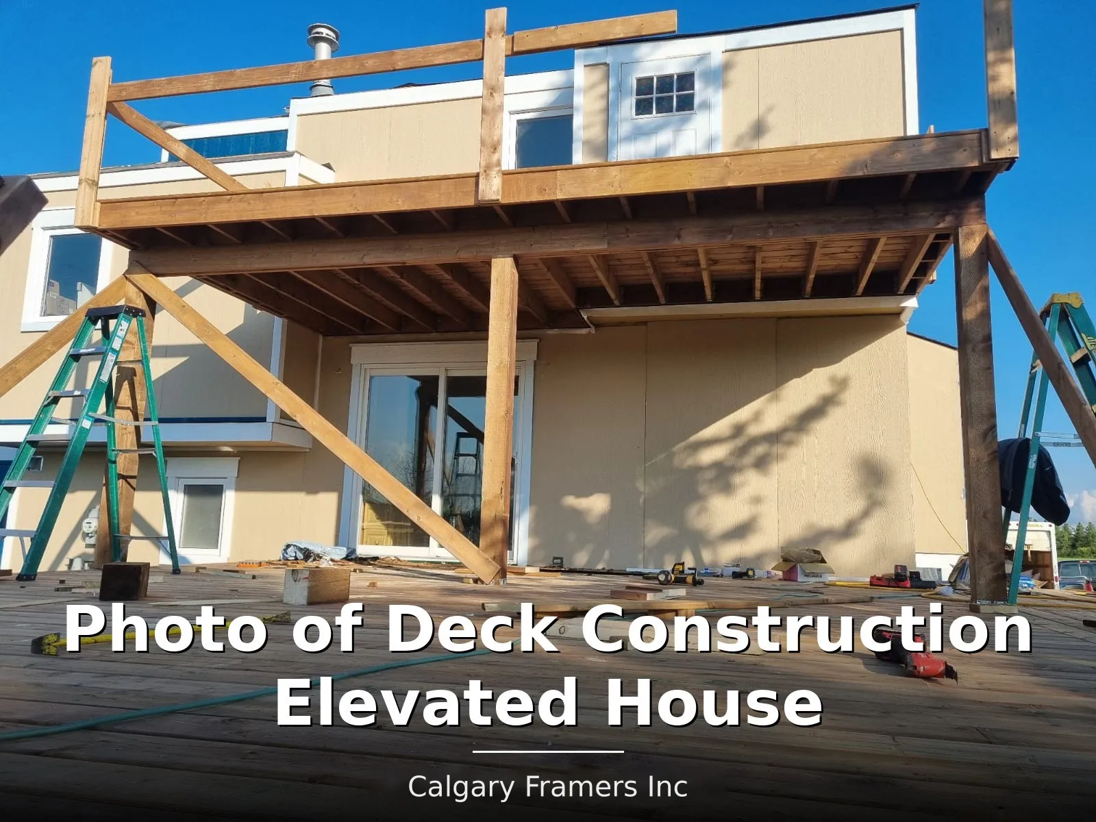 Elevated deck framed against a two-storey Calgary house