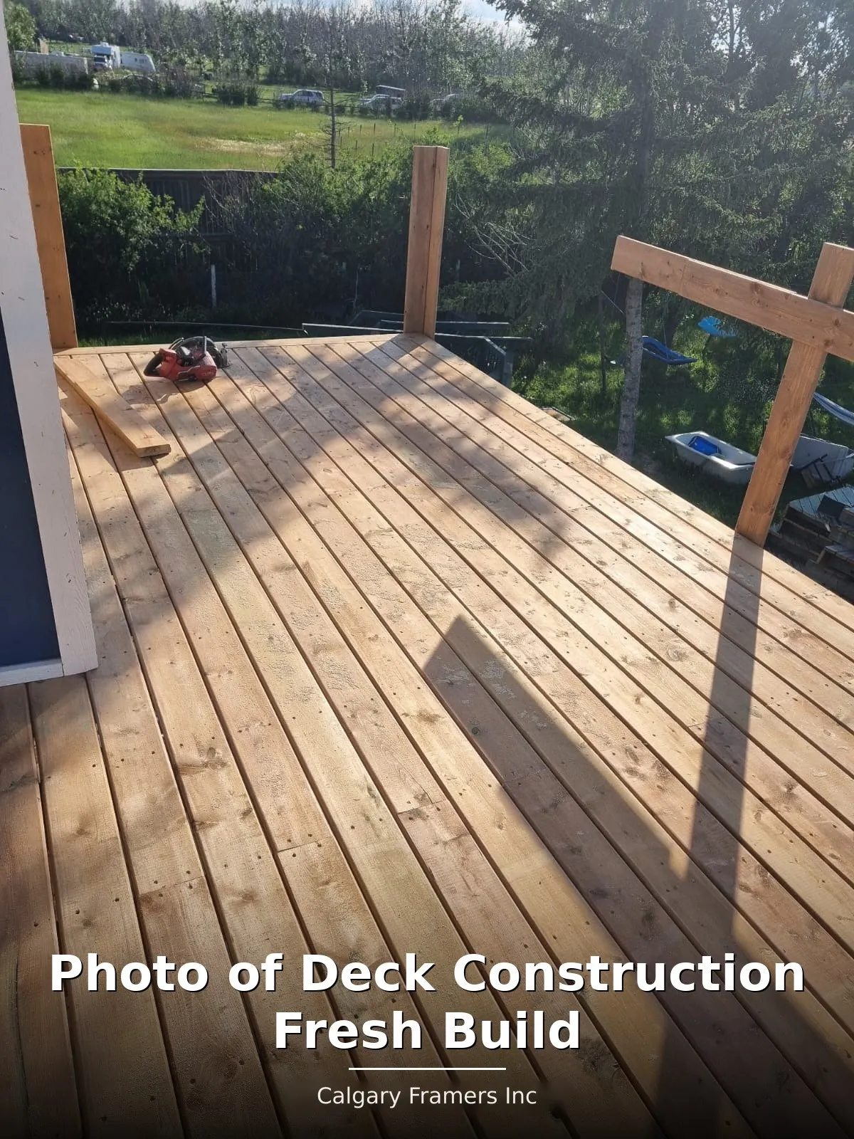 Freshly built deck frame with decking part-laid