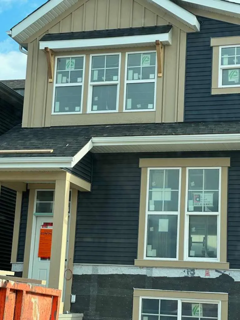 A fully framed home with Hardie board, trims and windows installed