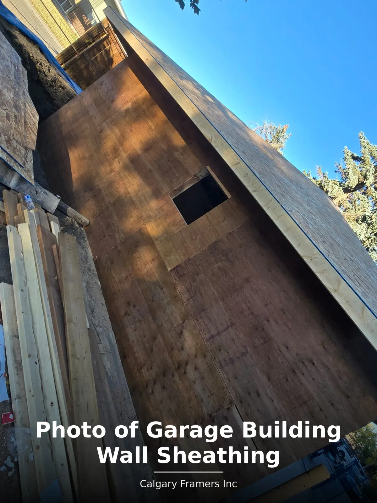 Plywood wall sheathing on a detached garage under construction